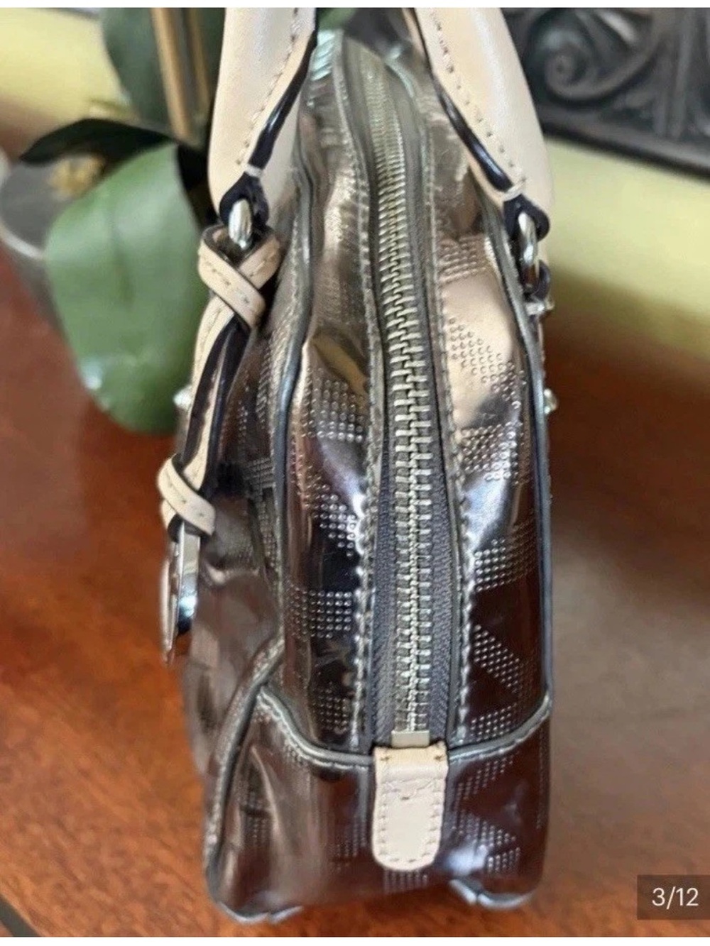 Michael Kors Metallic Silver Mini
Satchel w/Monogram MK Charm - Picture 3 of 10